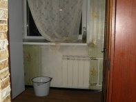 Комната, на полу линолеум