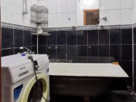Ванная комната выложена современной кафельной плиткой